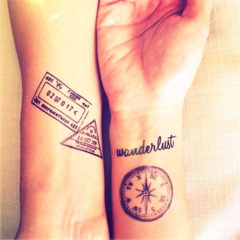 Stamp and compass tattoo