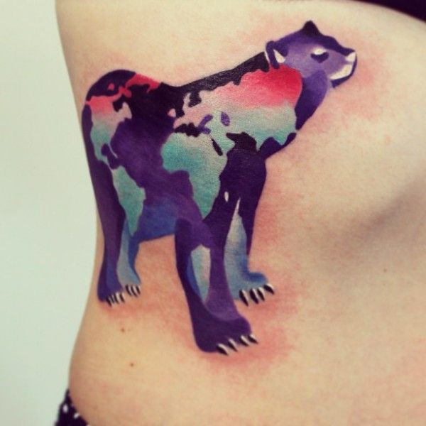 Animal and map tattoo
