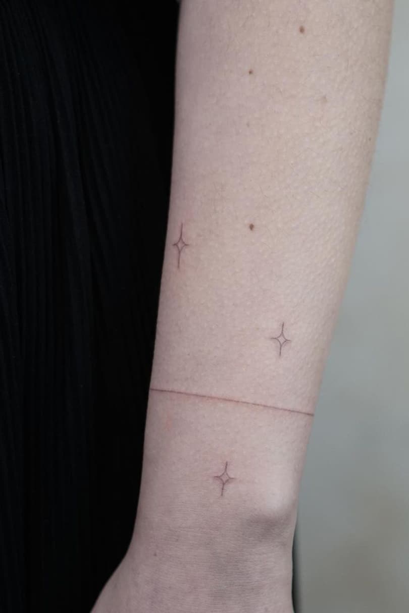 Star thin line armband tattoo
