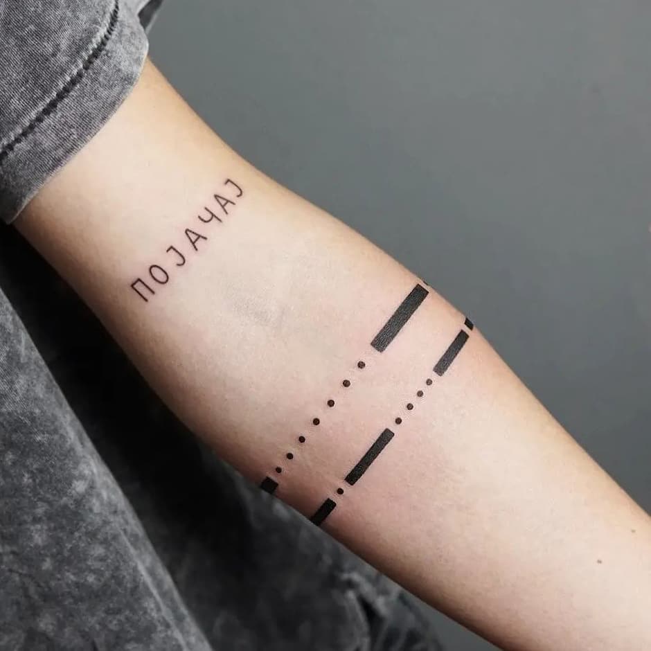 Morse code armband tattoo