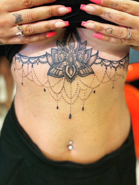 Mandala Sternum Tattoo