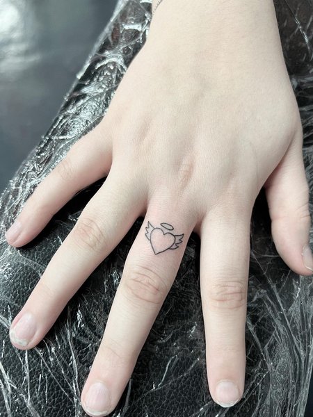 Angel Wing Tattoo On Finger