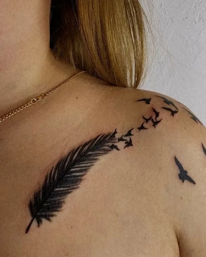 Chest Feather Tattoo