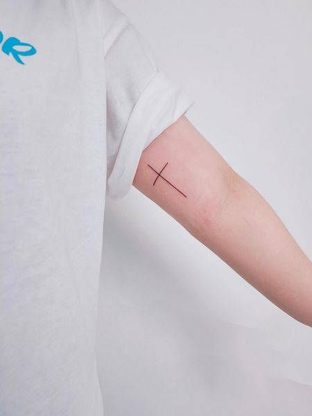 Cross Arm Tattoo