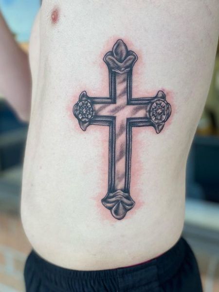 Cross Rib Cage Tattoo