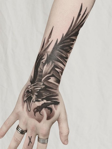 Crow Hand Tattoo