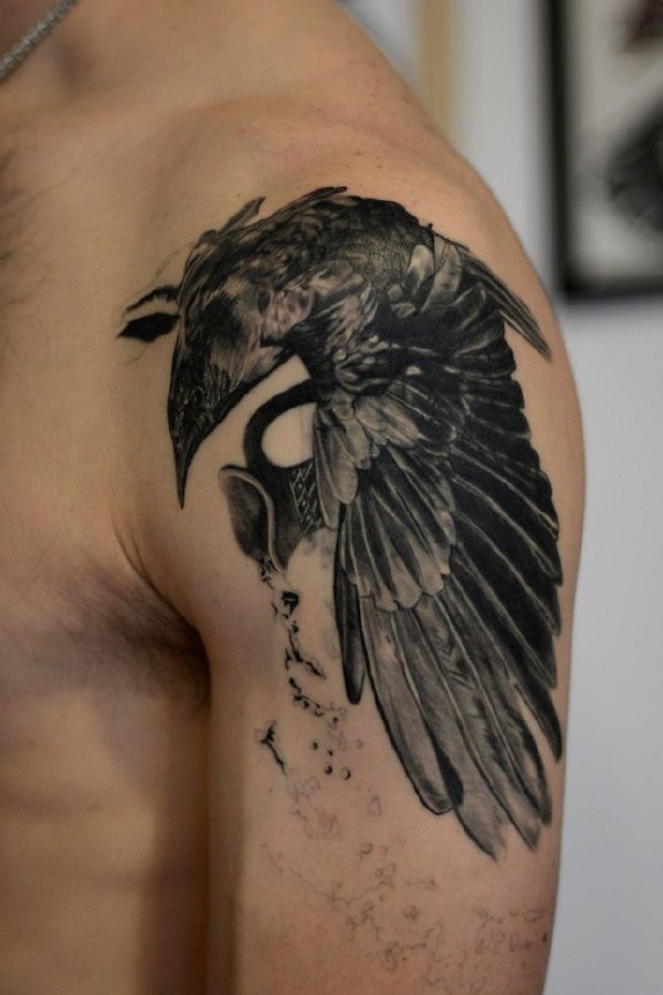 Crow shapeshifting tattoo on shoulder