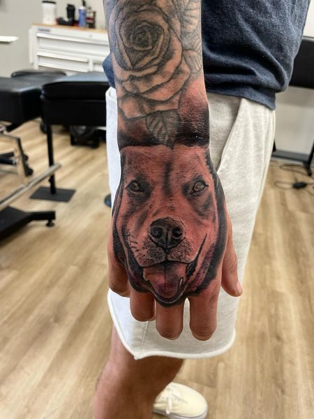 Dog Hand Tattoo
