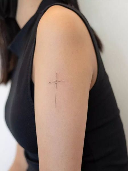 Fine Line Cross Tattoo