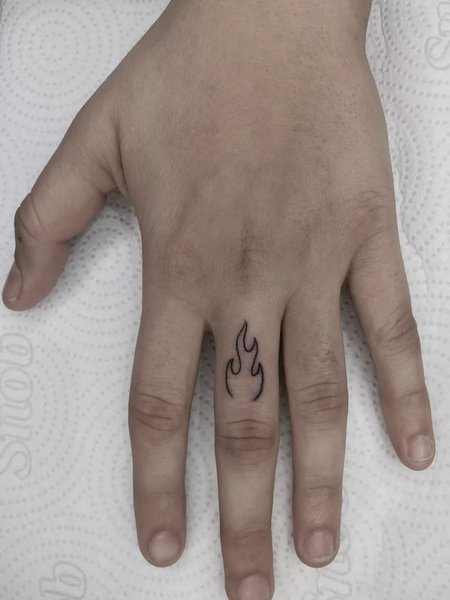 Flame Finger Tattoo