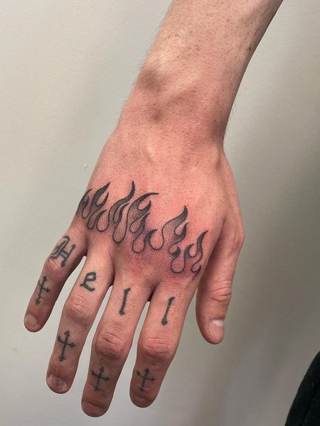 Flame Hand Tattoo
