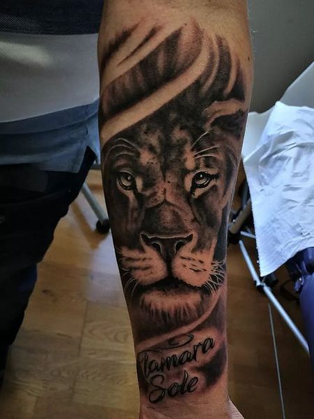 Lion Forearm Tattoo