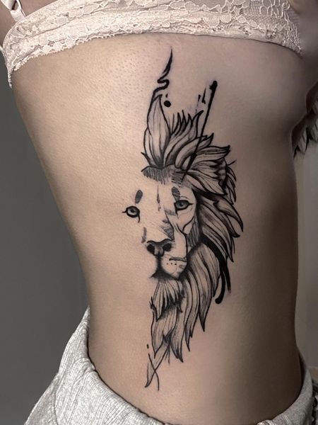 Lion Rib Tattoo