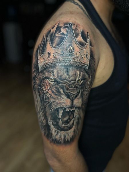 Lion With Crown Tattoo