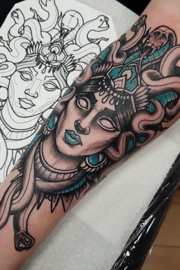 Medusa tattoo on the forearm