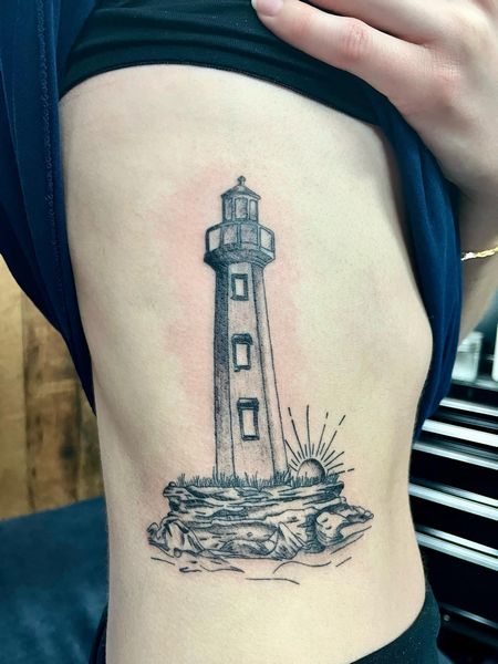 Rib Lighthouse Tattoo