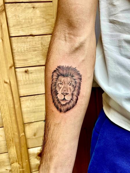 Small Lion Tattoo