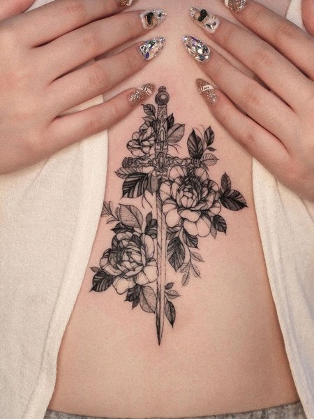 Sternum Flower Tattoo