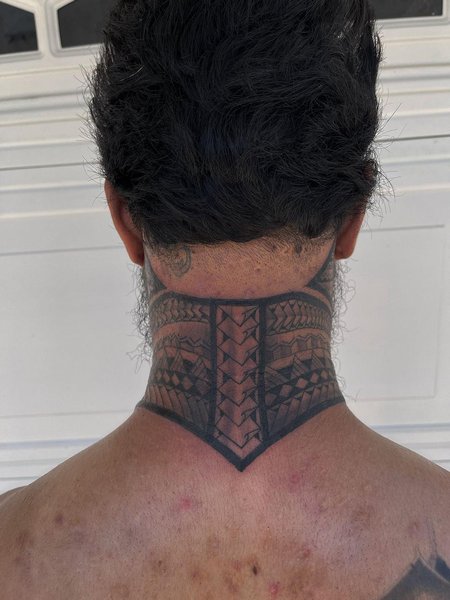 Tribal Back Of Neck Tattoo