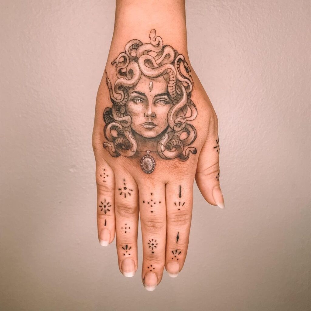 medusa tattoo finger