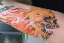 skull fire n flames tattoo on arm