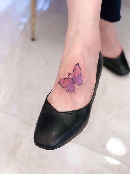 Butterfly Foot Tattoo