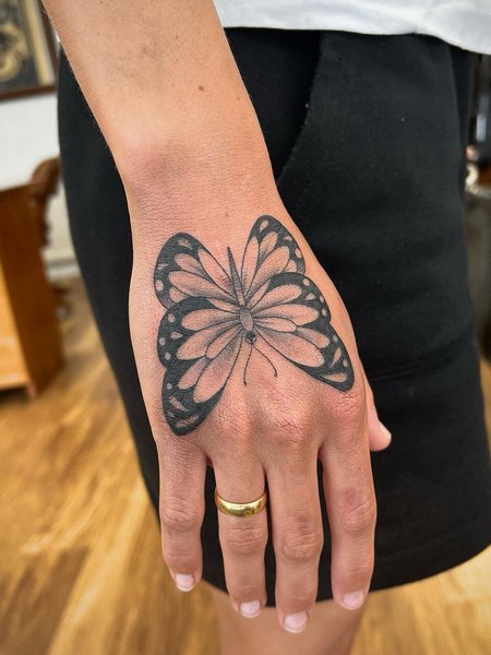 Butterfly Hand Tattoo