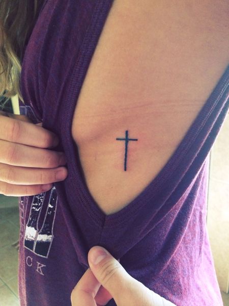 Cross Rib Tattoo