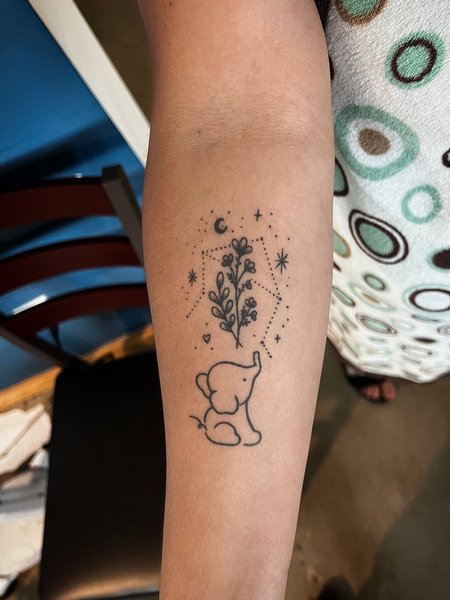 Elephant Arm Tattoo
