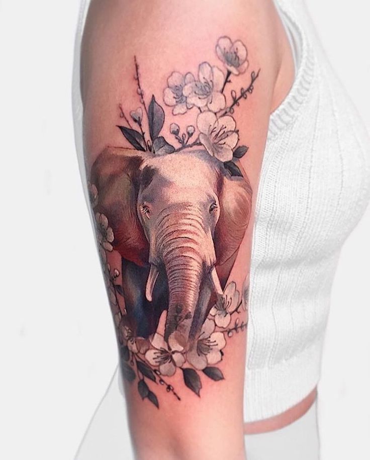 Elephant Tattoo with Flowers