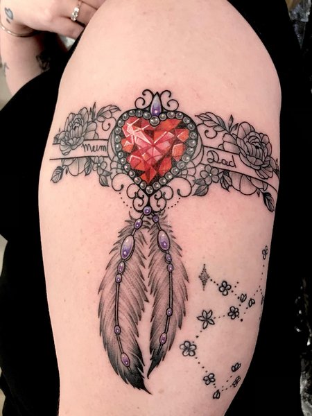 Female Feather Tattoo