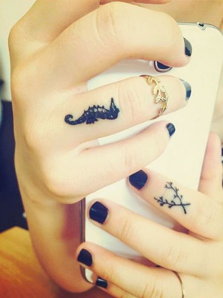 Finger Seahorse Tattoo