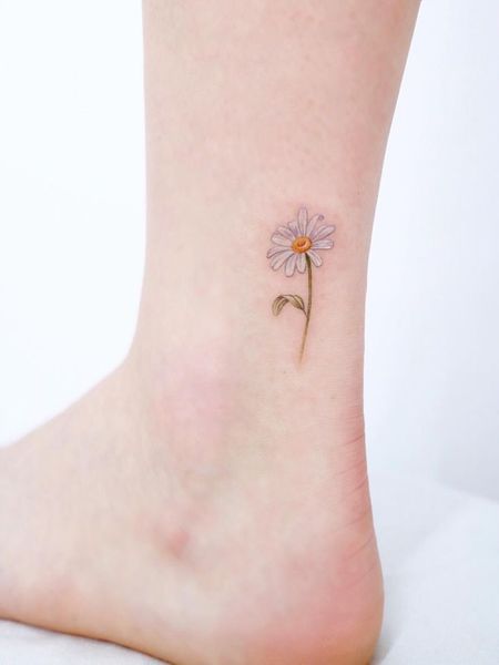 Minimalist Daisy Tattoo