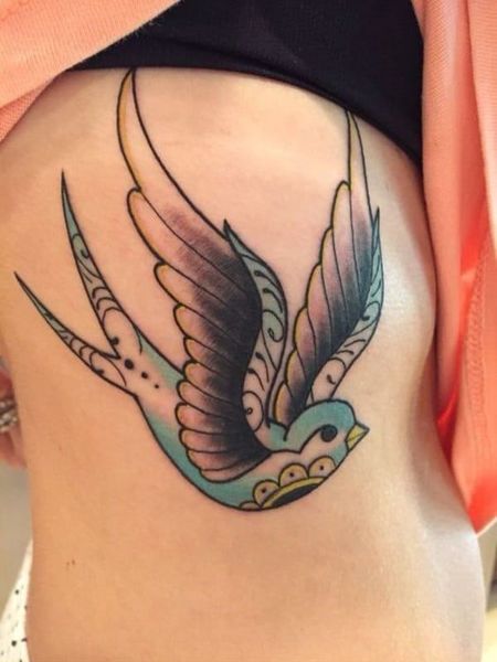 Rib Swallow Tattoo