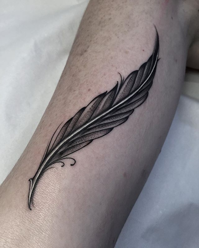 Simple Feather Tattoo