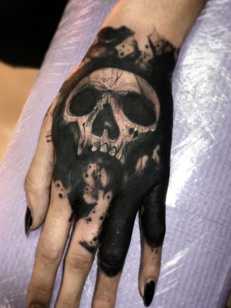 Skull Hand Tattoos For Women