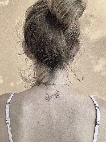 Small Back Tattoo