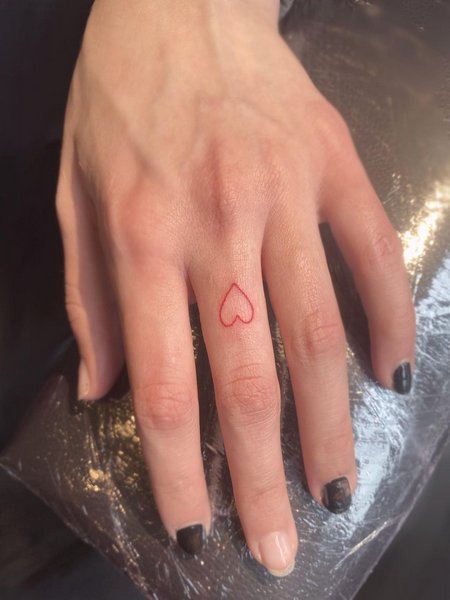 Small Finger Tattoo