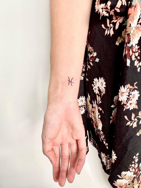 Small Pisces Tattoo