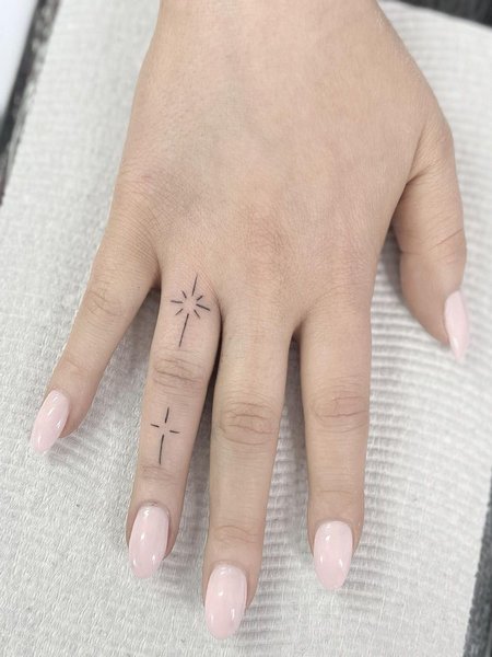 Star Finger Tattoo