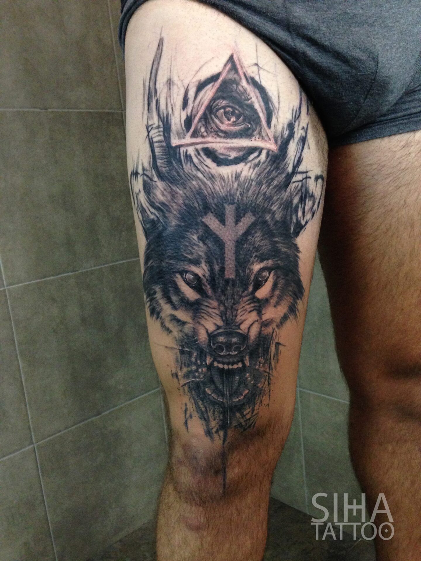 Thigh Wolf Tattoo