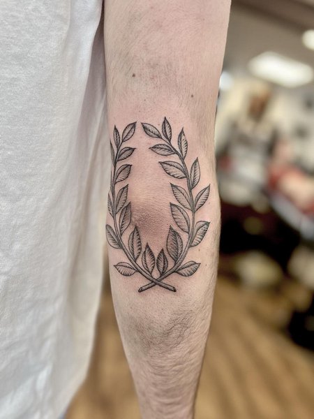 Wreath Elbow Tattoo