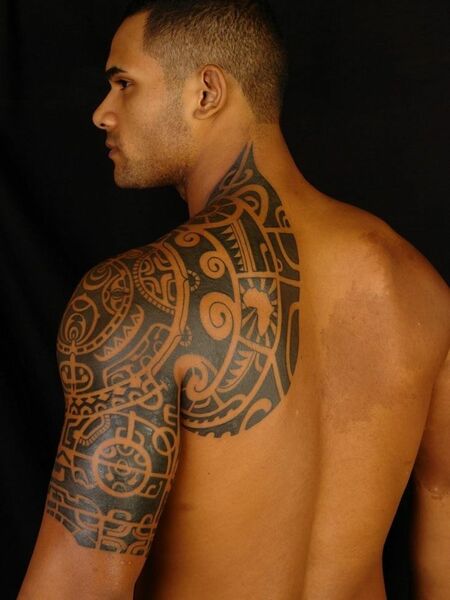 25. Back and Half Sleeve Tattoo