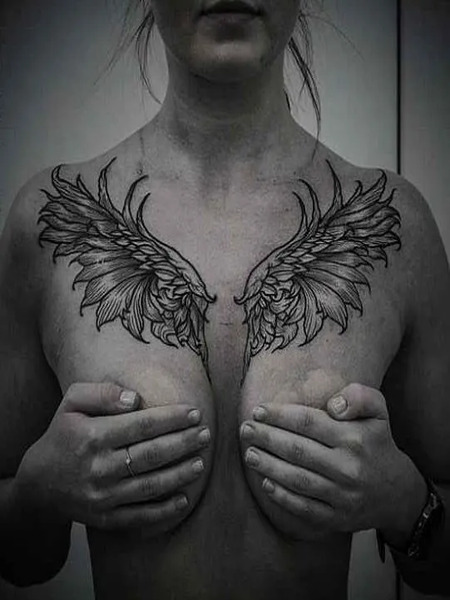 Angel Wing Chest Tattoo