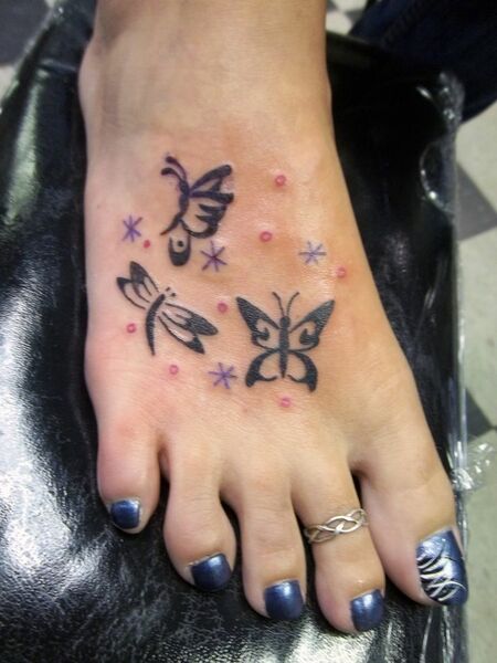 Butterfly Foot Tattoo