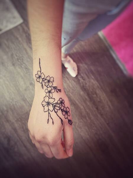 Cherry Blossom Hand Tattoo