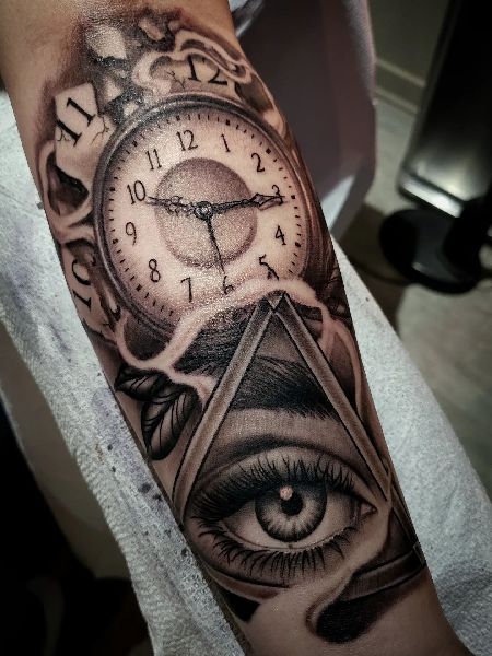 Clock forearm tattoo