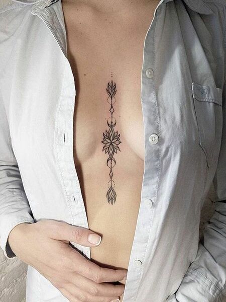 Delicate Chest Tattoo