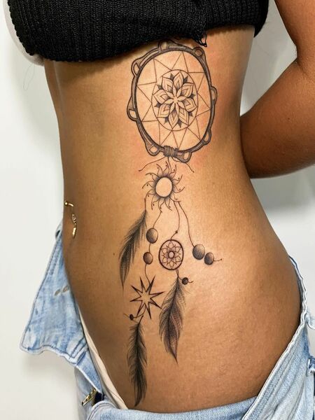 Dream Catcher Rib Tattoo