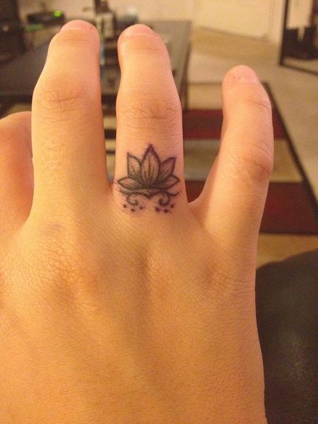 Finger Lotus Flower Tattoo